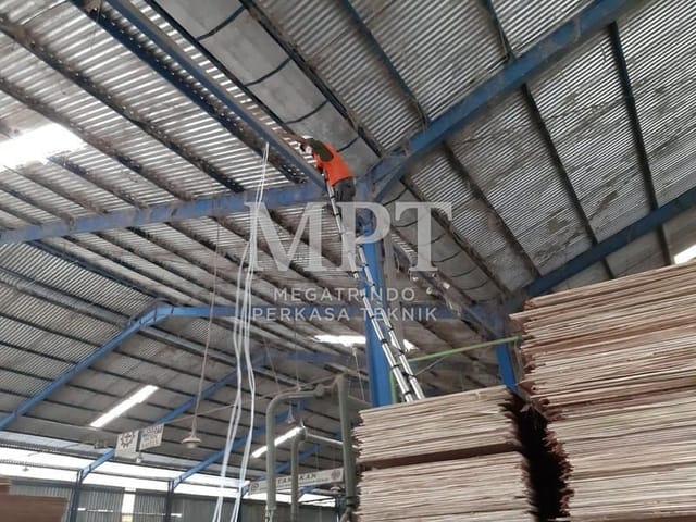CCTV camera installation on a warehouse roof