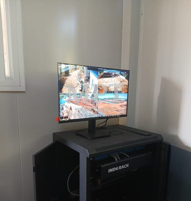 CCTV monitor on top of the rack showing site cameras