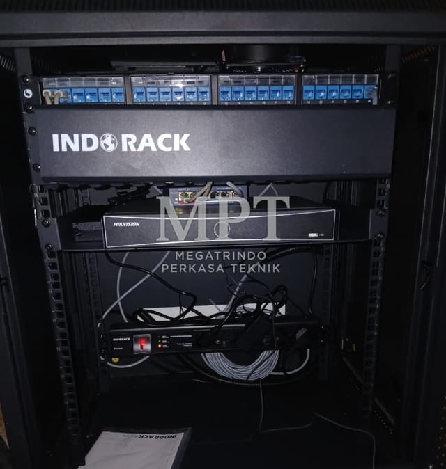 Server rack with a Hikvision NVR and patch panels
